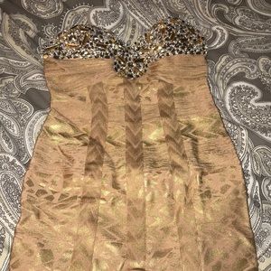 Gently worn embellished bandage dress